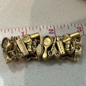 ADORABLE gold coloured hair product themed costume jewelry bracelet, stretchy